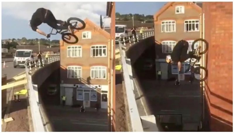 mid air flip on stunt bicycle, lands on building man makes netizen wonder