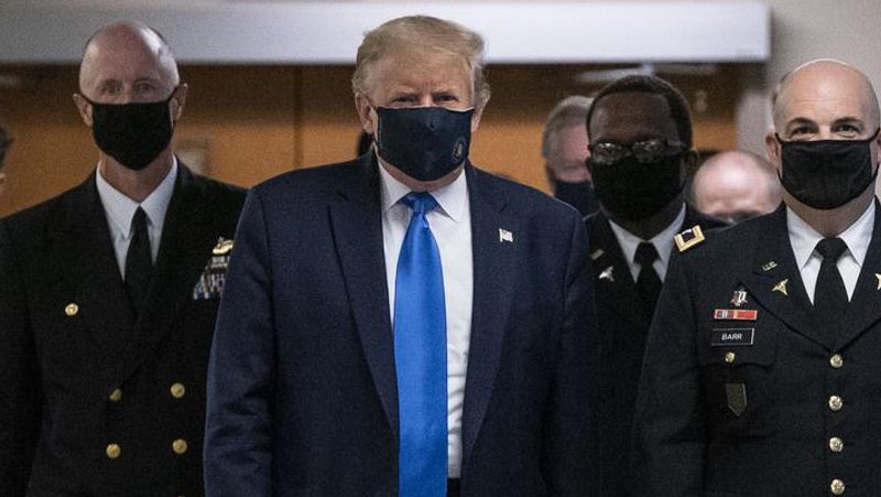 Corona Care America President Donald Trump wears face mask for the first time