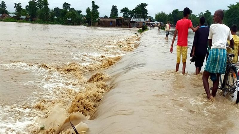 Drunken Man Crossing the bridge During Flood in Devadurga in Raichur District