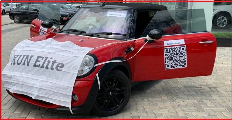 Coronavirus effect Mini cooper car wear mask to promote sales