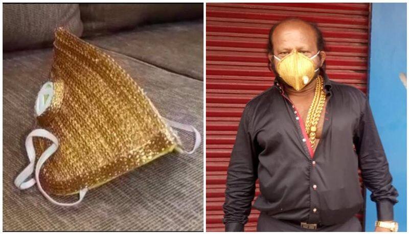 businessman wearing golden mask