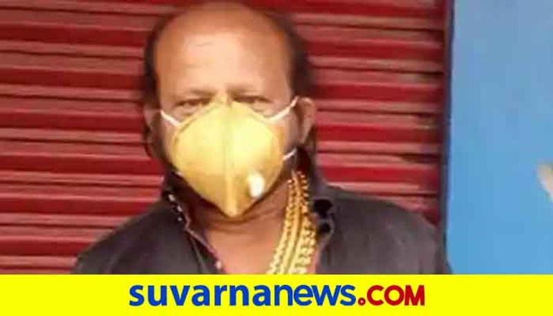 Gold mask trend in India Cuttack business wear gold mask to prevent corona