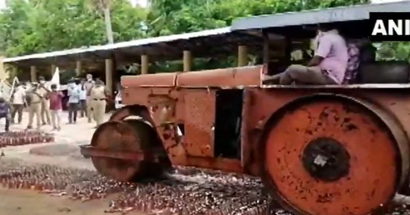 Big alcohol hunt in Andhra Pradesh  Liquor worth Rs 72 lakh was destroyed by  road roller