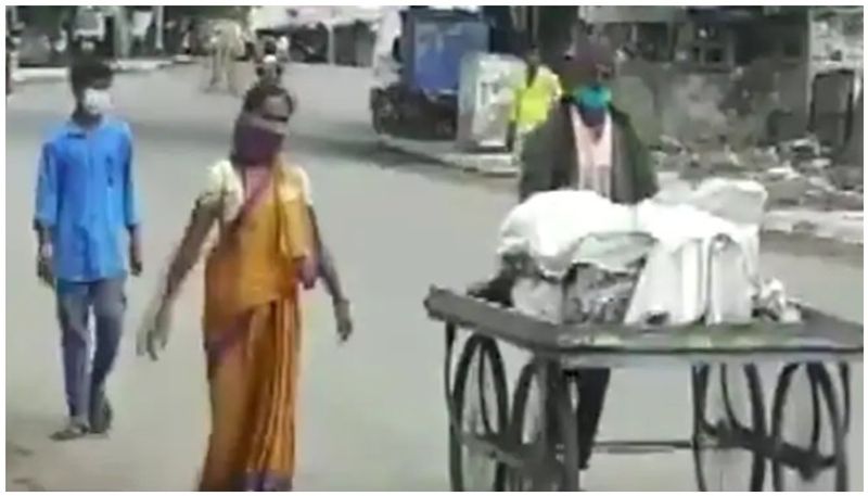 Shunned by kin over Covid fear, Karnataka woman carries husband's body on cart for final rites