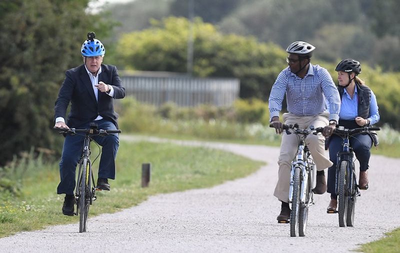 UK Prime Minister Boris Johnson rids a made in India Hero Cycles