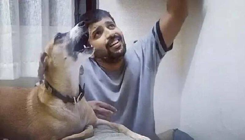 viral video of pet dog sings a song with owner