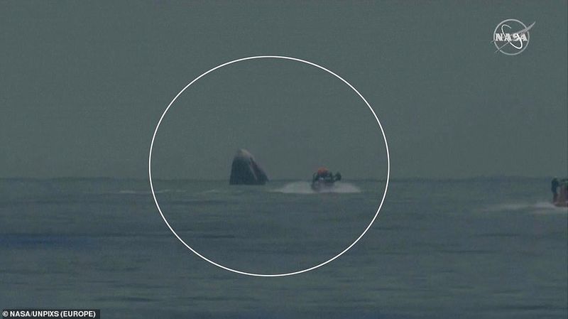 Dragon Capsule after splashing down in the Gulf of Mexico at the end of historic two month mission