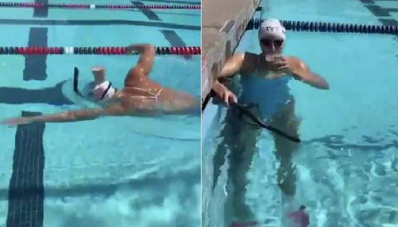 Katie Ledecky Swims With Glass Of Milk On Head viral video