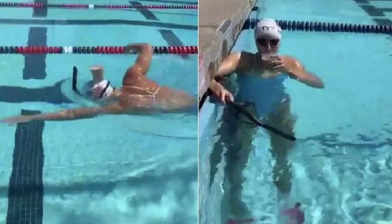 Katie Ledecky Swims With Glass Of Milk On Head viral video