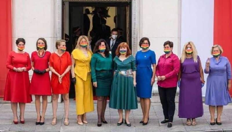 Polish MPs turn up in coordinated outfits to form rainbow