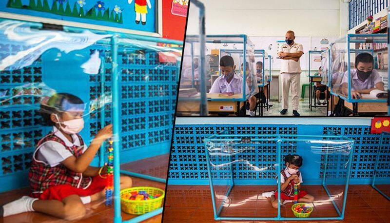 Coronavirus Schools reopen in this country; students sit in plastic boxes - gps