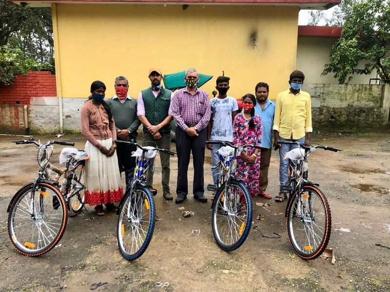 Father son duo donate bicycles to workers and students in Kodagu