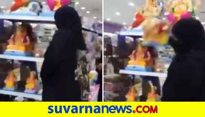 Muslim woman smashes statues of Hindu deity viral video Bahrain