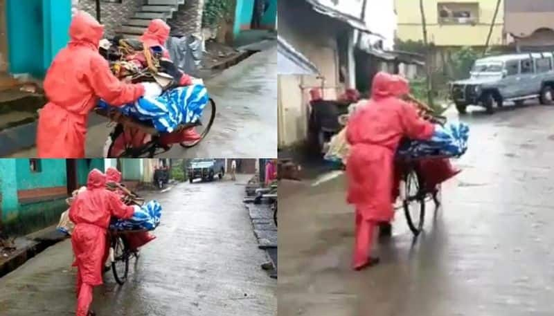 family carries body on cycle in rain congress slams karnataka government