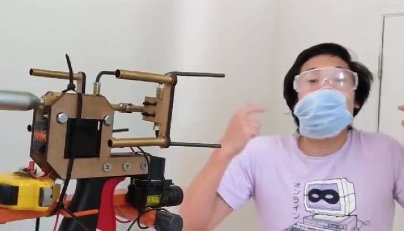 Man makes machine that puts masks on people s faces