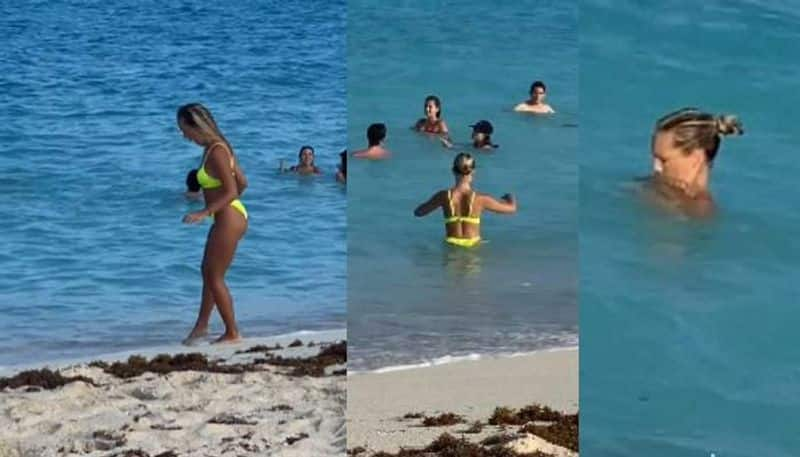 Man pranks girlfriend by swapping her bikini with dissolves in water