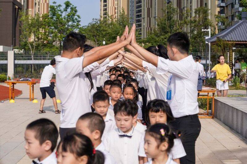 Schools open in virus-ridden city of Wuhan: China