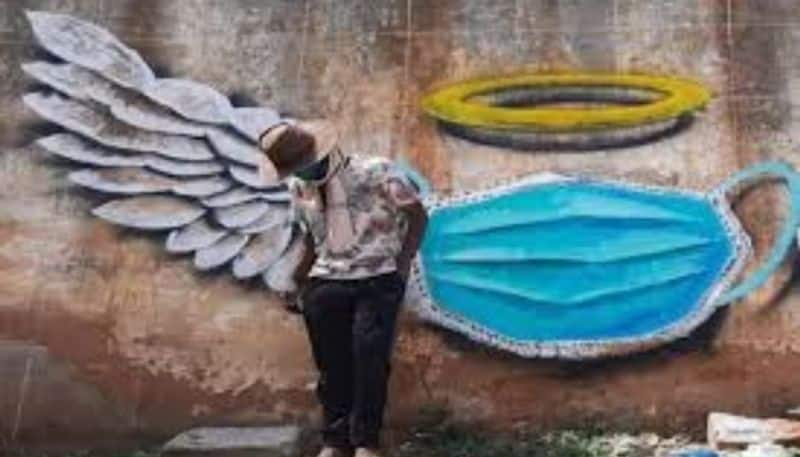 artist create painting on bengaluru streets for covid awareness