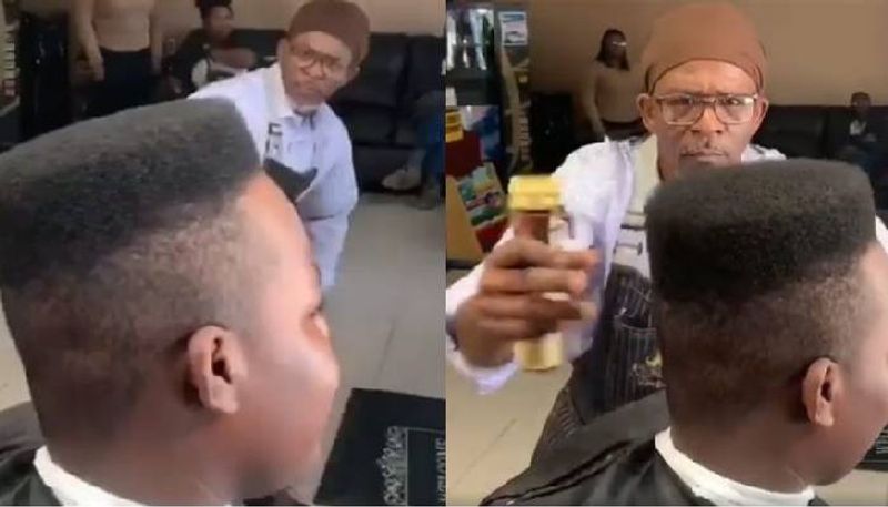 Viral video of barber inspecting a customers haircut