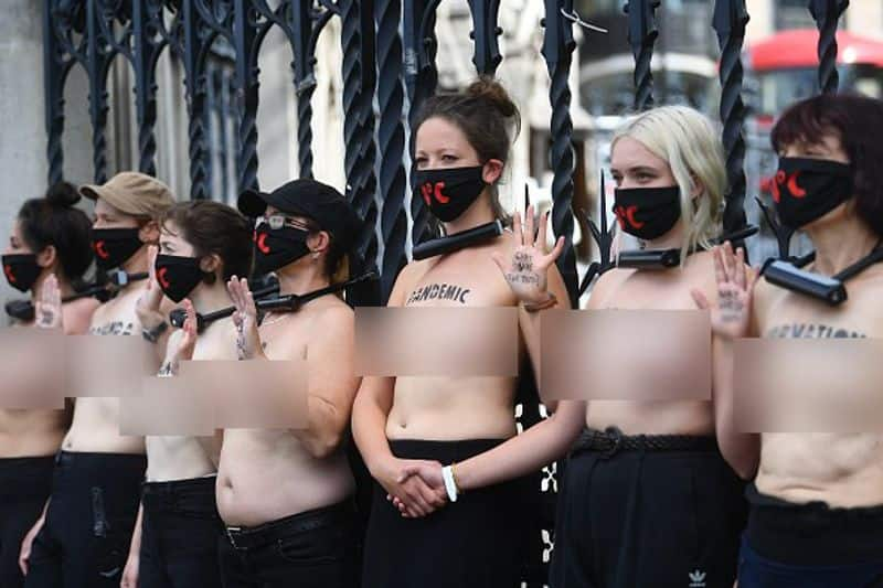 Bare chest protest in front of  british parliament