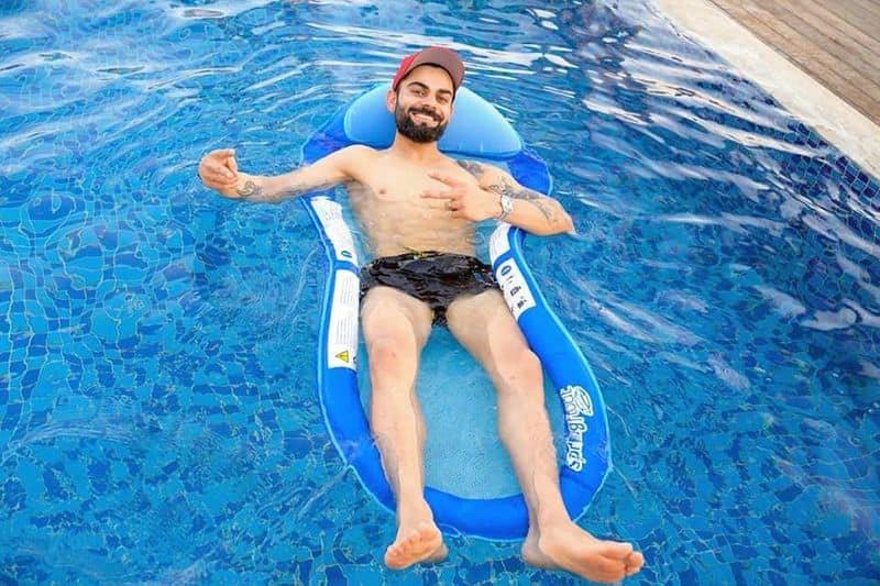 IPL 2020 Virat Kohli enjoys a day at the pool with the RCB squad