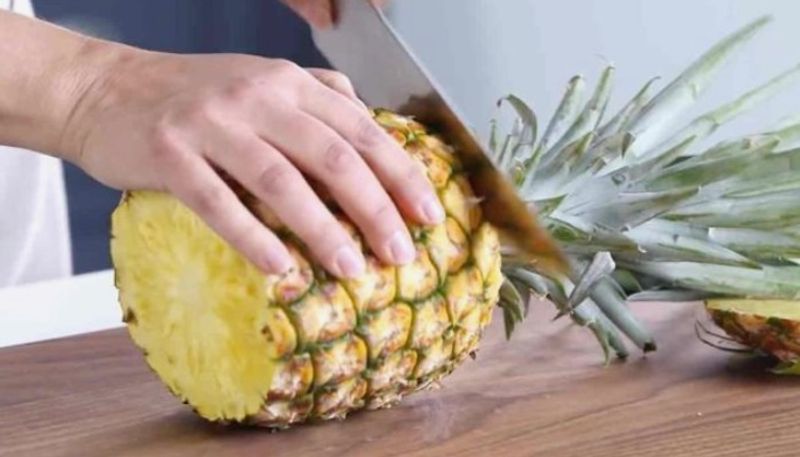 see how to remove eyes of pineapple