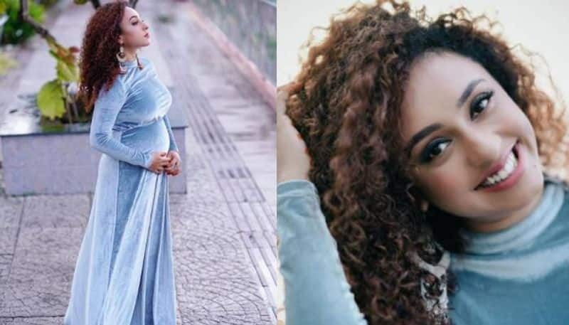 pearle maaney in maternity dress