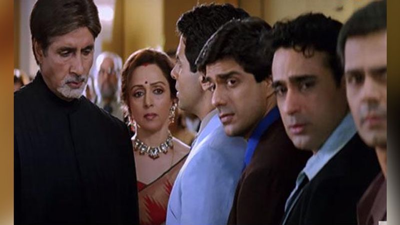 Why Amit ji adopt a child even after he have 4 children in Baghban cinema