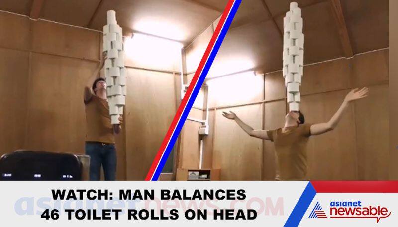 Man balances 46 toilet rolls on head, sets Guinness World Record - gps