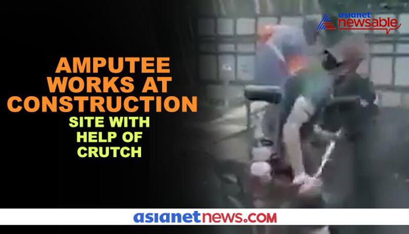 Video of amputee working at construction site using crutch wins hearts of netizens - gps