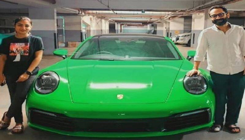 Fahadh Faasil and actress Nazria Nazim with their new Porsche 911 Carrera