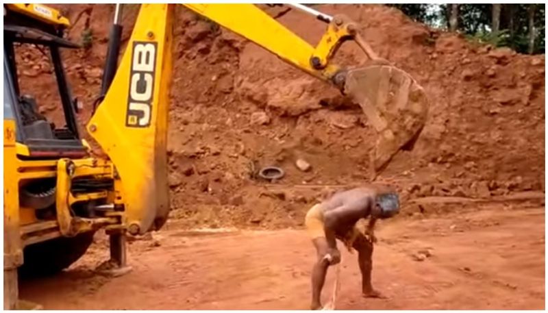 Man uses JCB excavator to scratch his back viral video