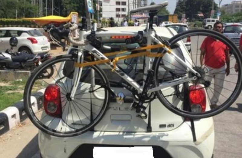 Carrying a cycle on a rack on car without proper RTO permissions might invite fines ckm