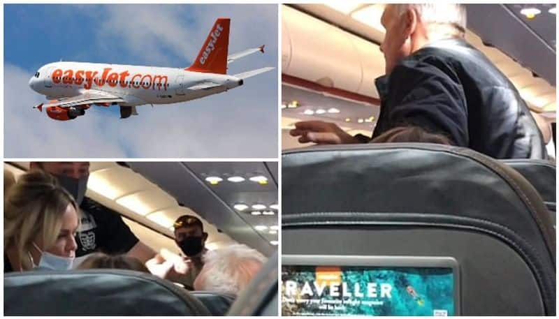 passenger refuses to wear facemask in flight and foul mouth wife slaps him