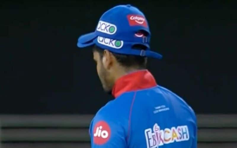 IPL 2020 Heres the reason behind players sporting more than one cap on the field