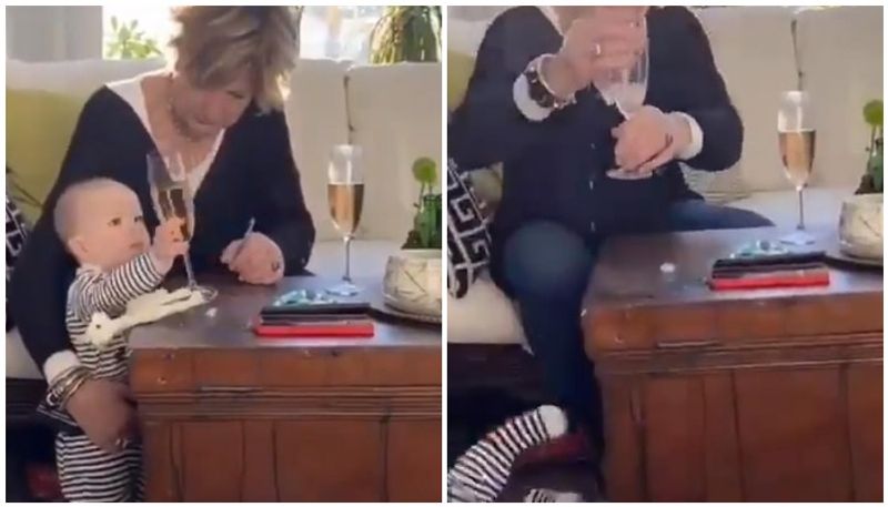 Grandmother did to the baby when Wine glass was about to fall down Watch the video