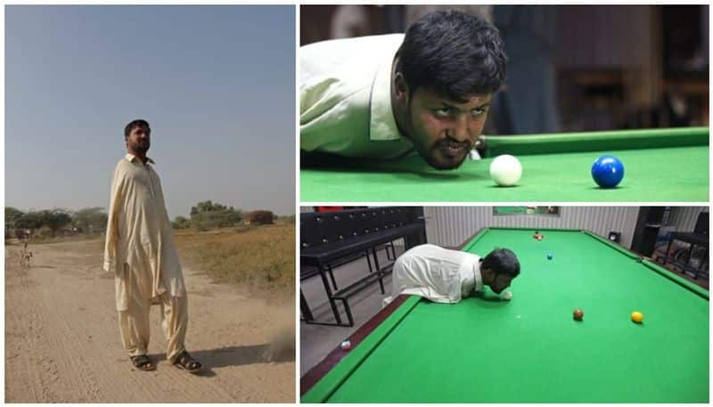 born without hands man uses his chin to play the game of snooker in Pakistan