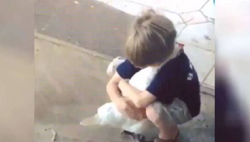 viral video of boy gives close hug to hen