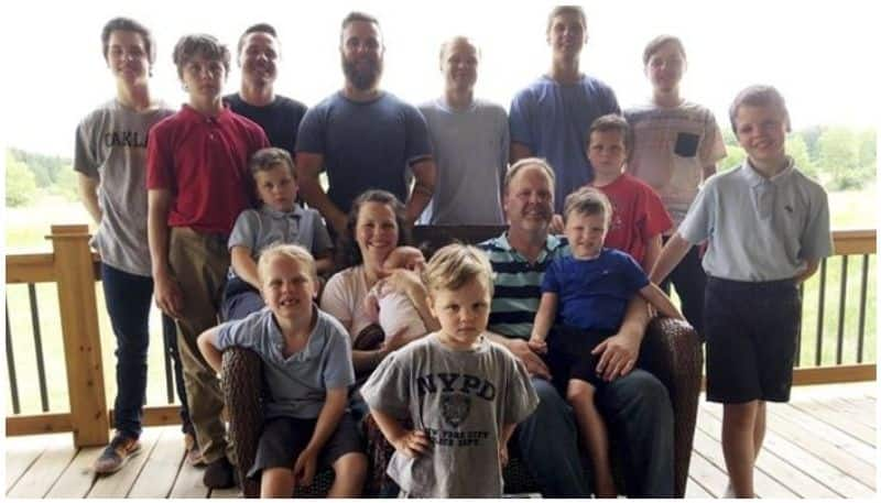 couple from Michigan who have 14 sons welcomed their first daughter