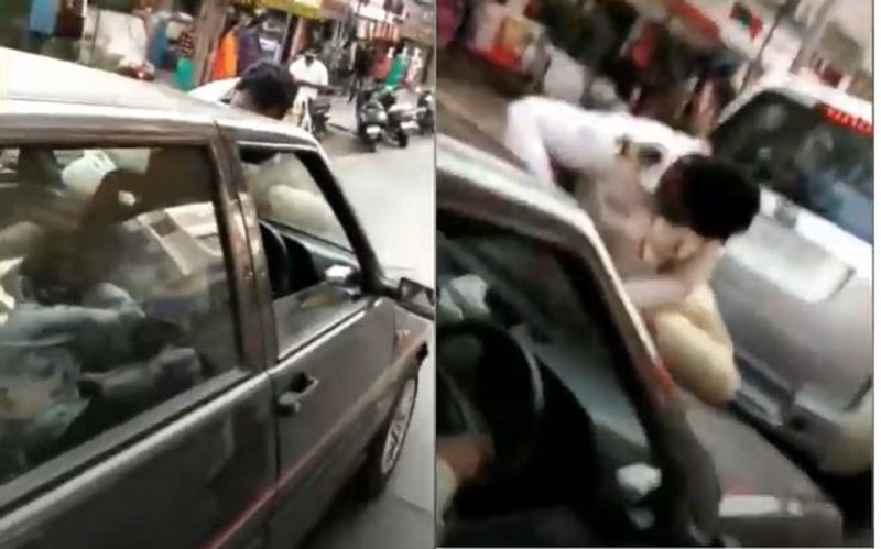 Pune Traffic policeman was dragged on car bonnet for about one kilometer ckm