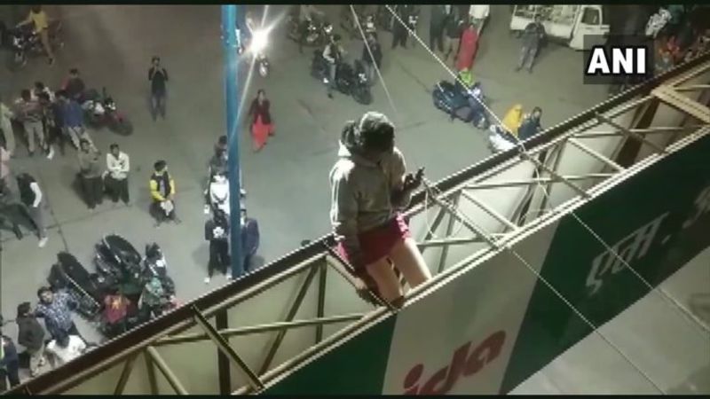 Minor girl climbs on top of the hoarding after mother refuses to marry her off to the lover