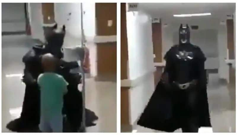 doctor dresses as batman to make toddler who fights against cancer