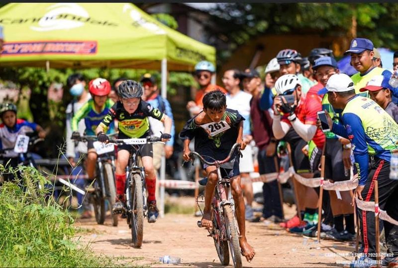 cambodian boy races barefoot with a broken bicycle makes netizens shower sponsorship