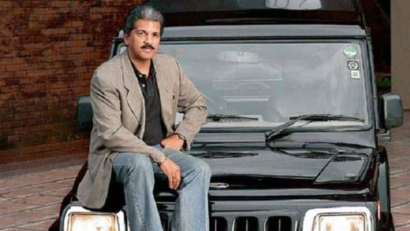 anand mahindra shares video of low cost car says in tweet tesla may not be able to match this vehicle