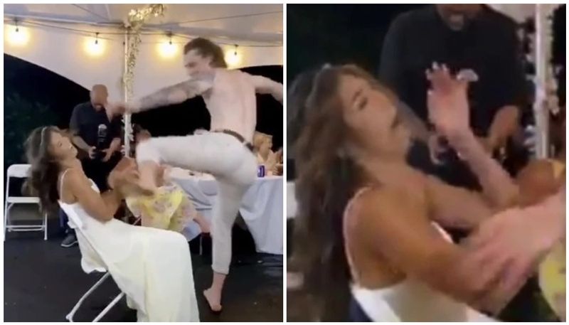 Awkward moment husband ruins his wedding by booting the bride in the face