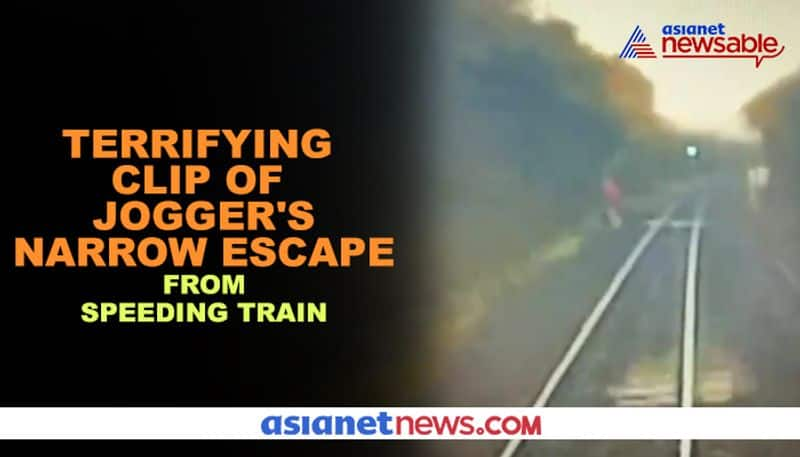 Viral Video: Jogger has narrow escape from speeding train - gps