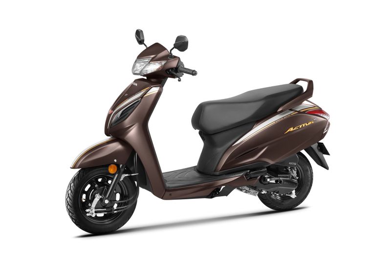 Honda celebrates 20th anniversary of activa scooter in India launches special edition ckm