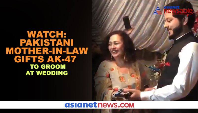 Pakistani mother-in-law gifts AK-47 to groom at wedding - gps