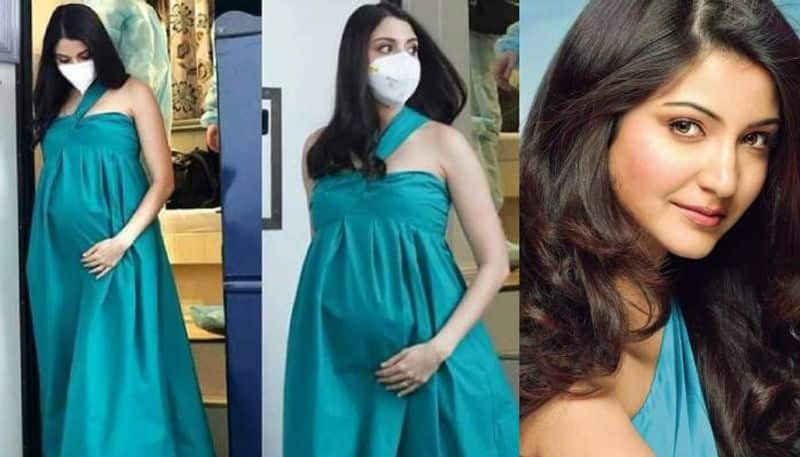 Pregnant Anushka Sharma in green maxi dress