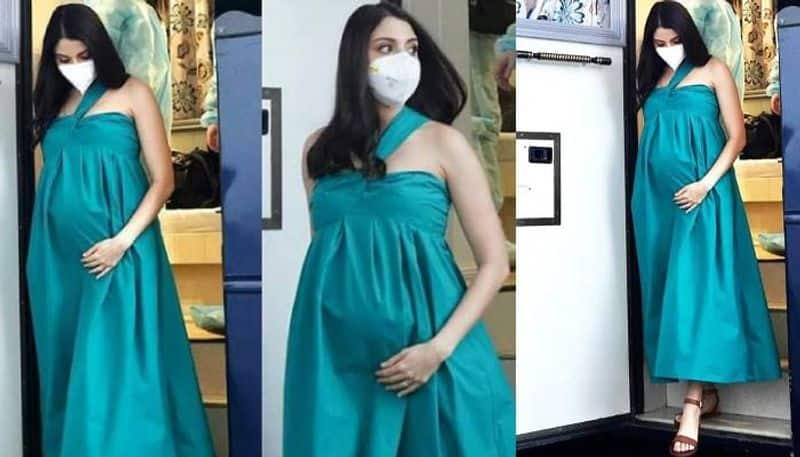 Pregnant Anushka Sharma in green maxi dress